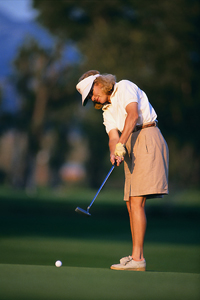 Lady golfing